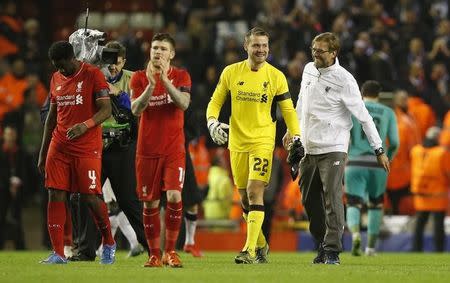 Football Soccer - Liverpool v FC Girondins de Bordeaux - UEFA Europa League Group Stage - Group B - Anfield, Liverpool, England - 26/11/15 Liverpool manager Juergen Klopp, Alberto Moreno, Simon Mignolet and Kolo Toure celebrates at the end of the match Reuters / Andrew Yates Livepic