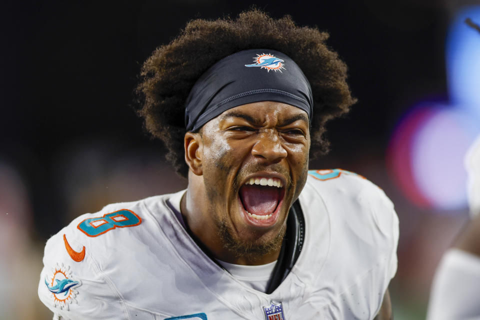 FILE - Miami Dolphins safety Jevon Holland (8) reacts after defeating the New England Patriots 24-27 in an NFL football game on Sunday, Sept. 17, 2023, in Foxborough, Mass. Holland was voted one of the top five safeties at the midpoint of the season by The Associated Press. (AP Photo/Greg M. Cooper)