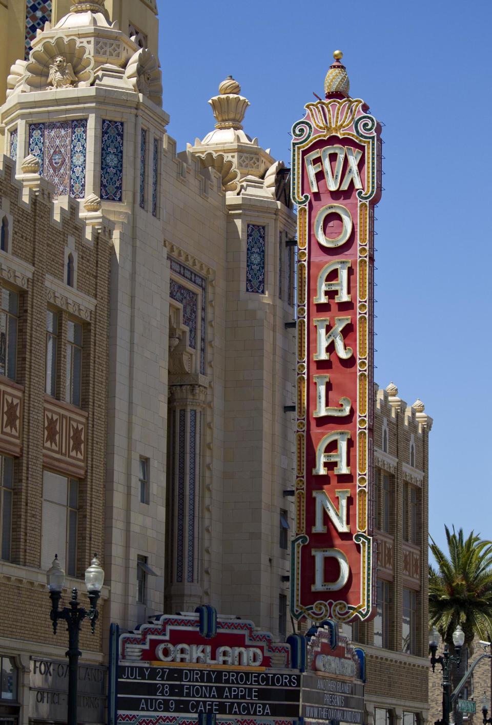 In this photo taken Wednesday July 4, 2012 shown is the Fox Theater in Oakland, Calif. It’s not easy being Oakland. Growing up in the shadow of an icon is never a shoe-in, whether you’re a wannabe princess related to that attention-grabbing vamp Cinderella or a city living next door to fabled San Francisco. (AP Photo/Eric Risberg)