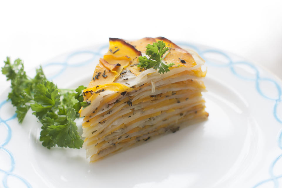 This March 31, 2014 photo shows roasted butternut and herb tart in Concord, N.H. (AP Photo/Matthew Mead)