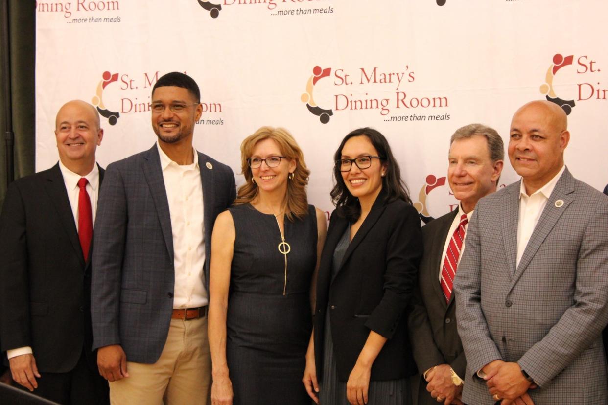 City leaders pose for a photo at a press conference held at the Stockton Memorial Civic Auditorium to announce the St. Mary's Dining Room Pathways Project on Monday, July 24, 2023.