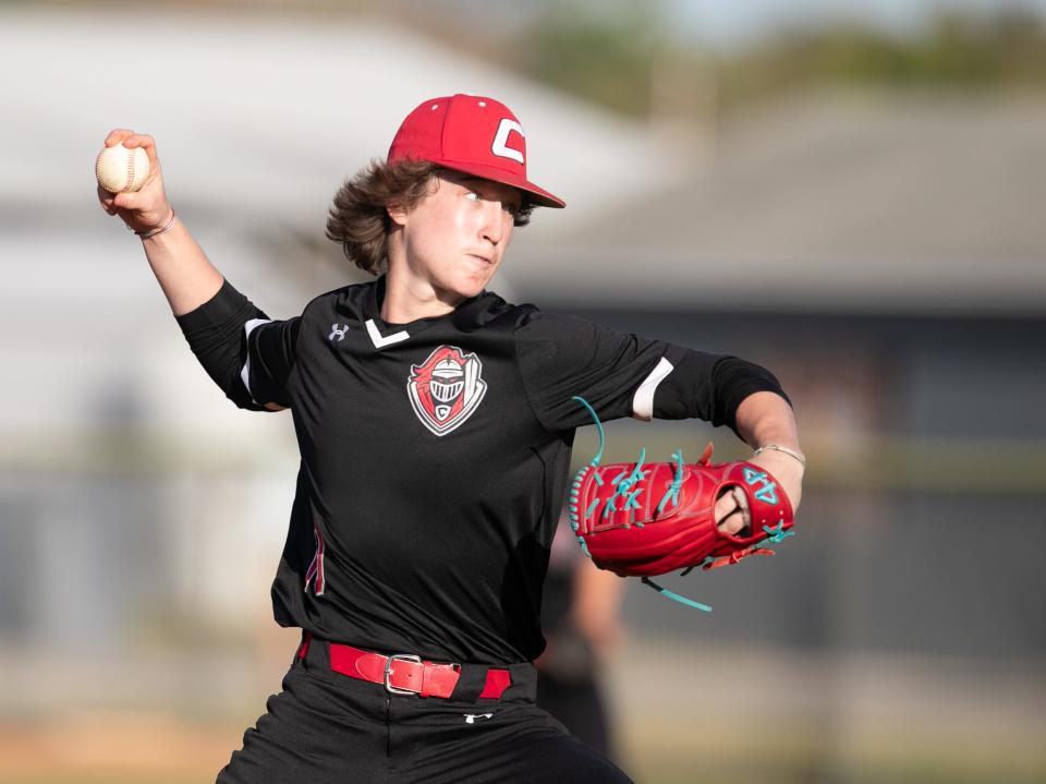 Creekside's Matthew Bysheim delivers a pitch against Columbia during a March game.