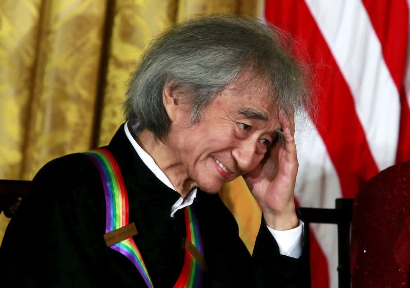 Japanese conductor and Kennedy Center Honors honoree Seiji Ozawa attends a reception at the White House