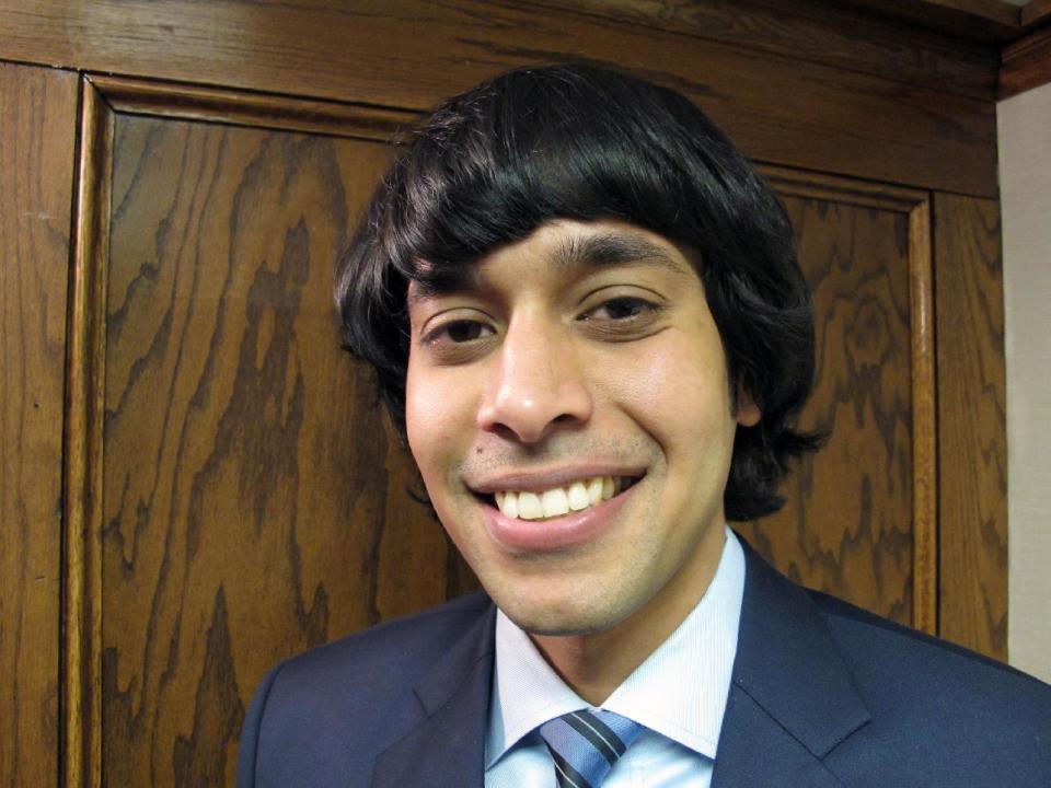 2Shezanne Cassim poses for the picture in the office of his attorney, Friday, Jan. 17, 2014, in Minneapolis. The American who spent nine months in prison in the United Arab Emirates for posting a satirical video online says he felt fear at times and was kept in filthy conditions. Cassim was accused of violating the country’s cybercrimes law. He says he did nothing wrong by posting his parody video online. (AP Photo/Amy Forliti)