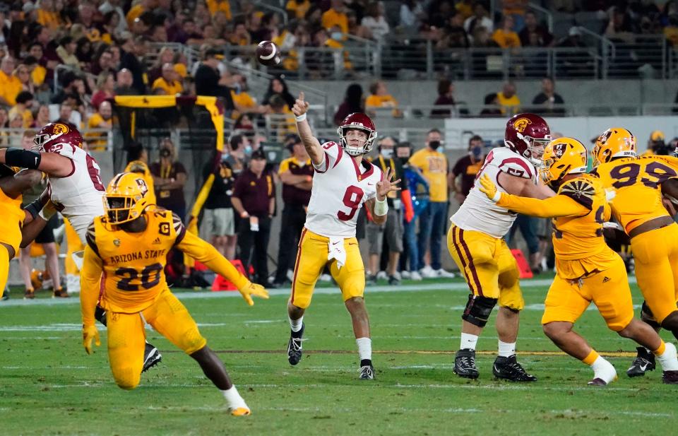 USC quarterback Kedon Slovis throws a pass against Arizona State at Sun Devil Stadium on Nov. 6, 2021.