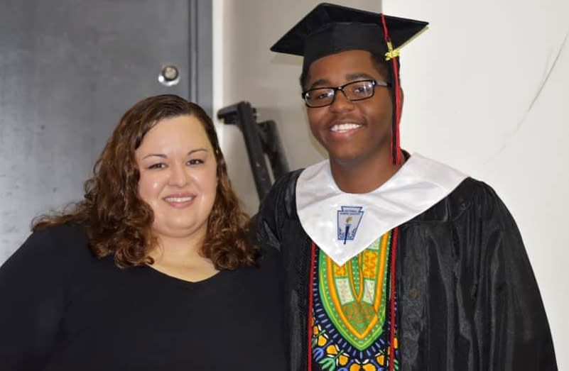 Image: Melinda Roellig with her student Carey Walls at his graduation in 2018. (Courtesy Alexandra Roellig)