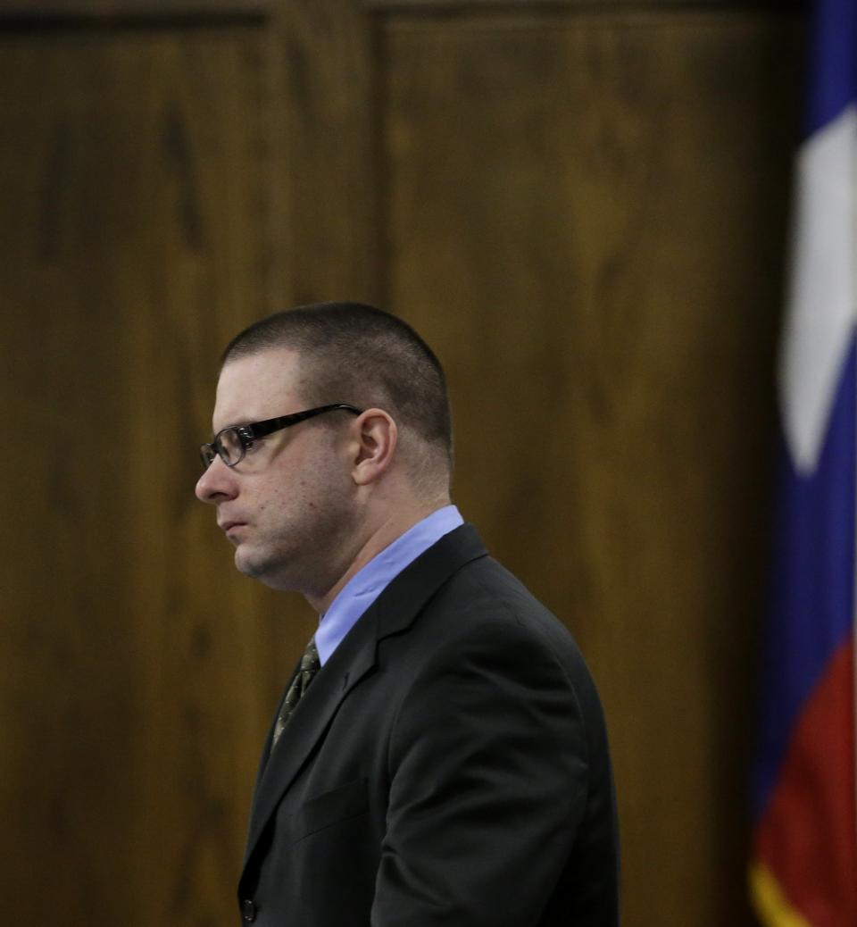 Eddie Ray Routh walks acros the court during his capital murder trial at the Erath County, Donald R. Jones Justice Center Friday, Feb. 20, 2015, in Stephenville, Texas.   Routh, 27, of Lancaster, is charged with the 2013 deaths of Navy SEAL Chris Kyle and his friend Chad Littlefield at a shooting range near Glen Rose, Texas. (AP Photo/LM Otero,Pool)