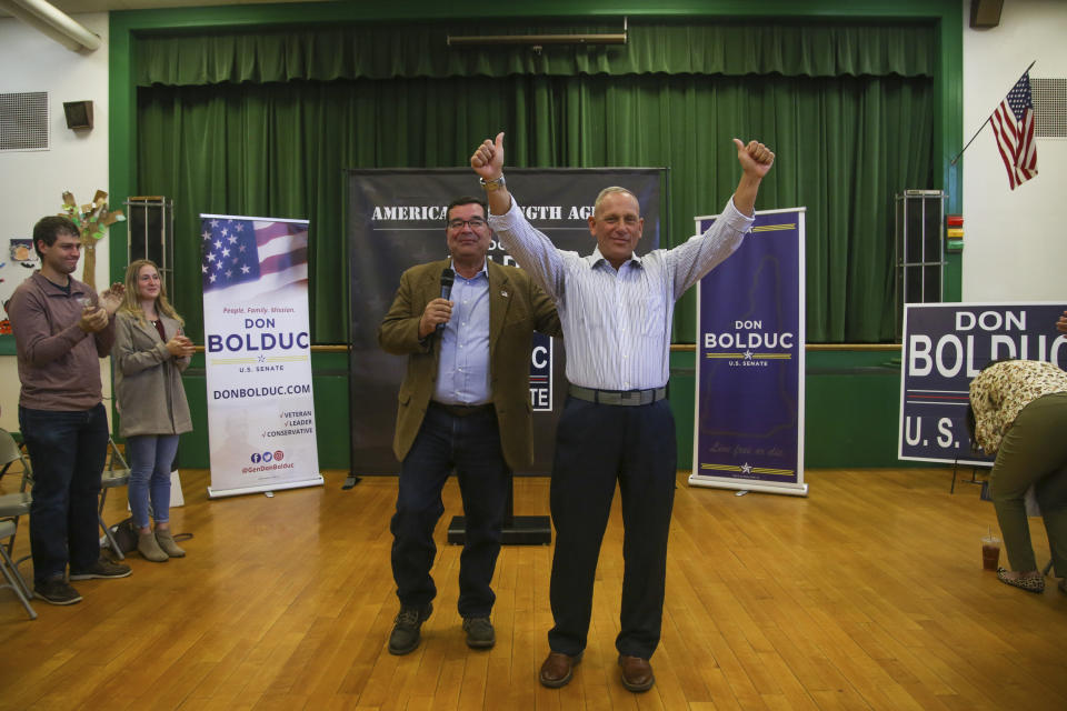 New Hampshire Republican U.S. Senate candidate Don Bolduc gives the thumbs after alongside supporter Steve Negron during a campaign gathering, Saturday Nov. 5, 2022, in Nashua, N.H. Bolduc is facing incumbent Sen. Maggie Hassan, D-NH, in the general election.(AP Photo/Reba Saldanha)