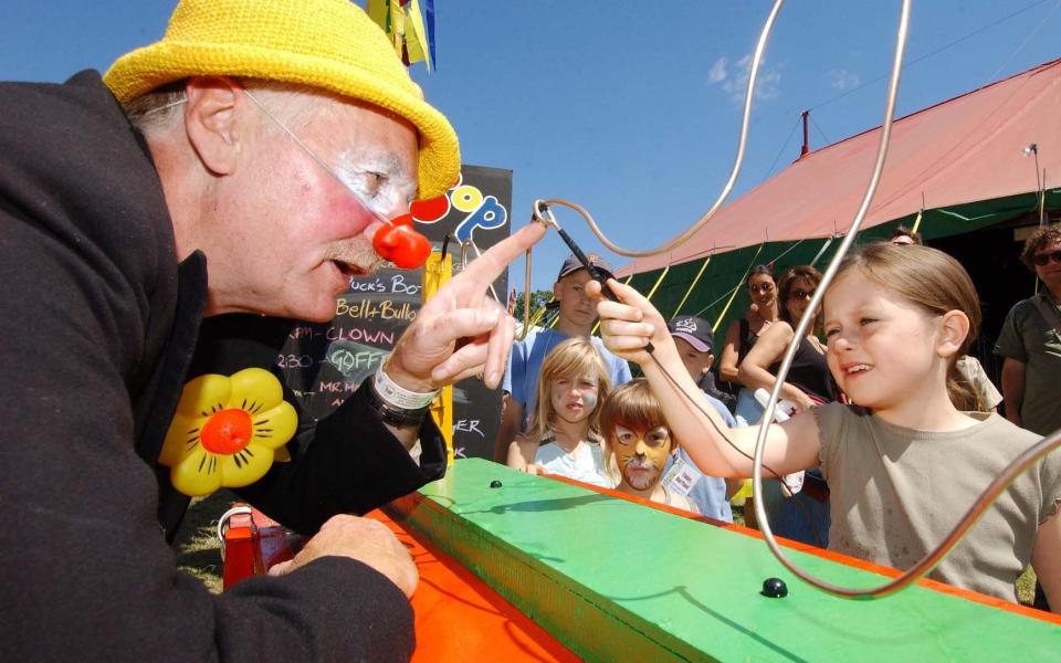 Children playing outside the Big top Circus in the Kidz Field at Glastonbury 2004 - Credit: John Taylor/John Taylor