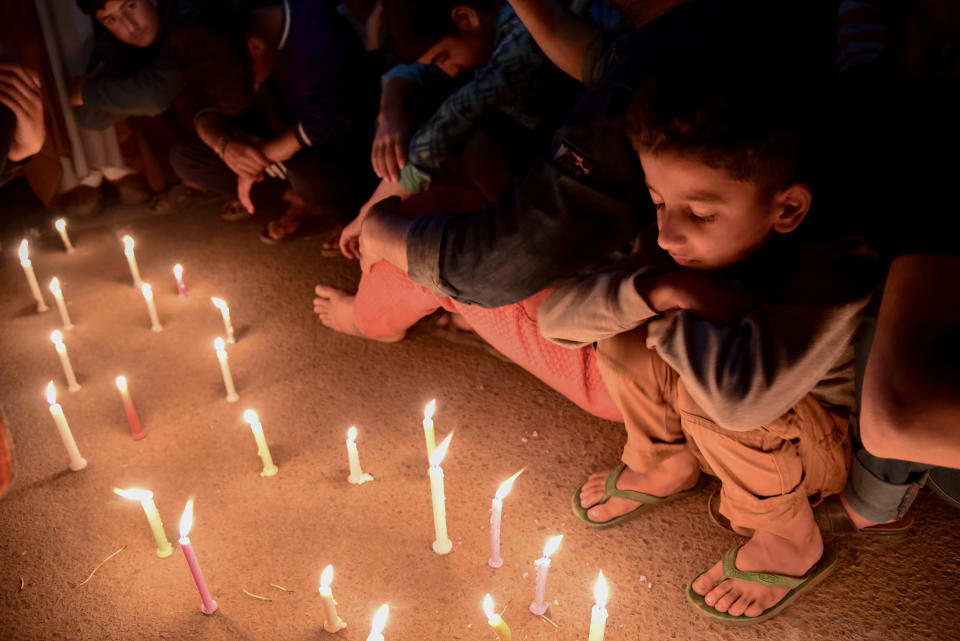 SRINAGAR, JAMMU AND KASHMIR, INDIA - 2019/04/28: Kashmiri Shia Muslims seen lighting candles during a protest in Srinagar. Shia protesters held a candle light vigil in Srinagar against the mass execution of 37 individuals in Saudi Arabia. According to Saudi Press Agency, those executed were accused of "forming a terrorist cell" and attacking a security outpost, killing a number of officers. (Photo by Idrees Abbas/SOPA Images/LightRocket via Getty Images)