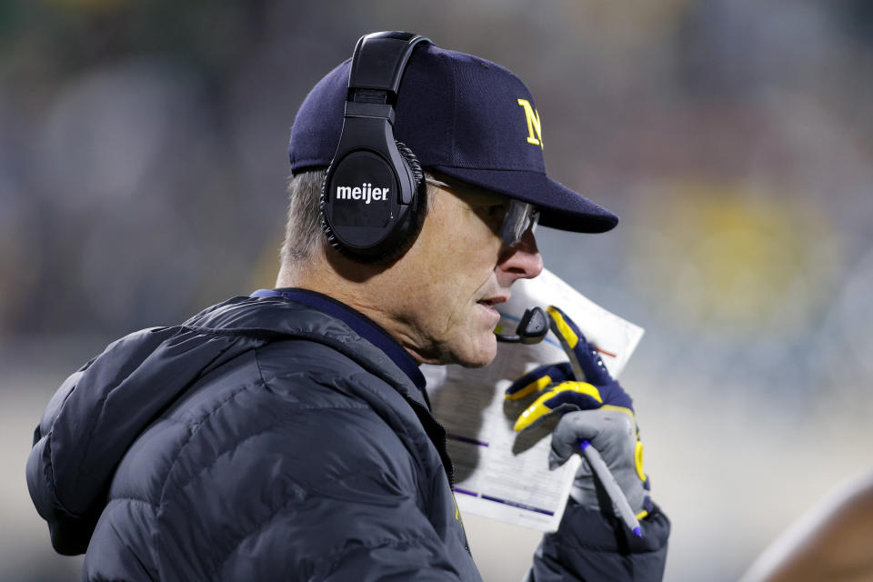 Michigan coach Jim Harbaugh looks on during the second half of an NCAA college football game against Michigan State, Saturday, Oct. 21, 2023, in East Lansing, Mich. (AP Photo/Al Goldis)
