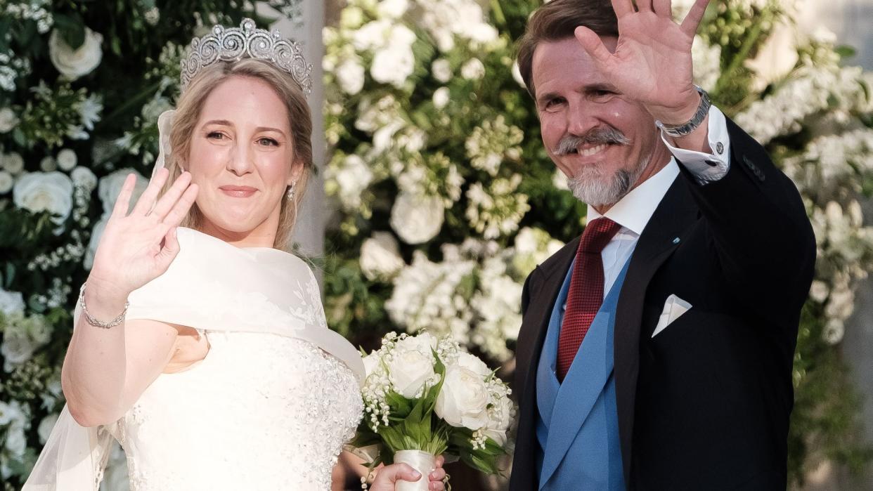 Princess Theodora and her brother Pavlos waving on her wedding day