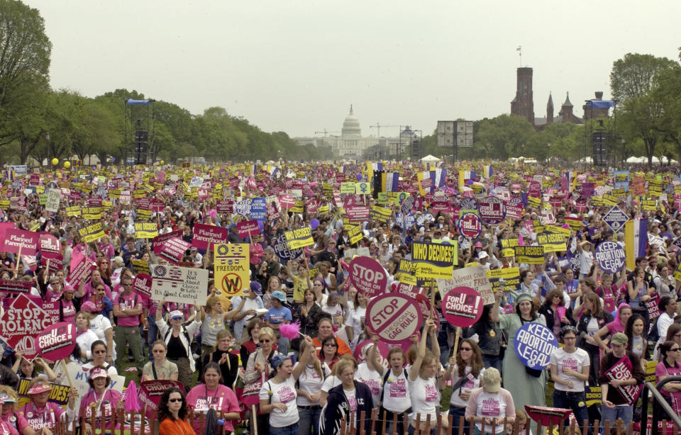 With the U.S. Capitol in the background, thousands of pro-choice supporters take part in the March For Women's Lives on the National Mall in Washington, D.C., on April 25, 2004.