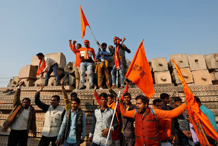 FILE PHOTO: Supporters of the Vishva Hindu Parishad (VHP), a Hindu nationalist organisation, shout slogans after attending "Dharma Sabha" or a religious congregation organised by the VHP in Ayodhya, Uttar Pradesh, India, November 25, 2018. REUTERS/Pawan Kumar/File Photo