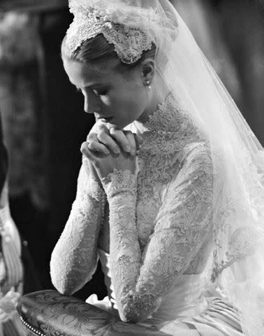 <p>Bettmann</p> Grace Kelly during her wedding to Prince Rainier of Monaco on April 20, 1956.
