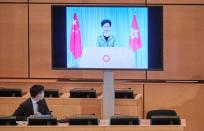 Lam, chief executive of Hong Kong, addresses by video link the Human Rights Council in Geneva