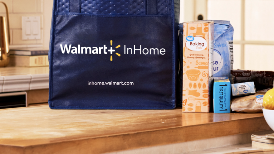 walmart plus in home blue insulated bag with groceries on a wooden kitchen table