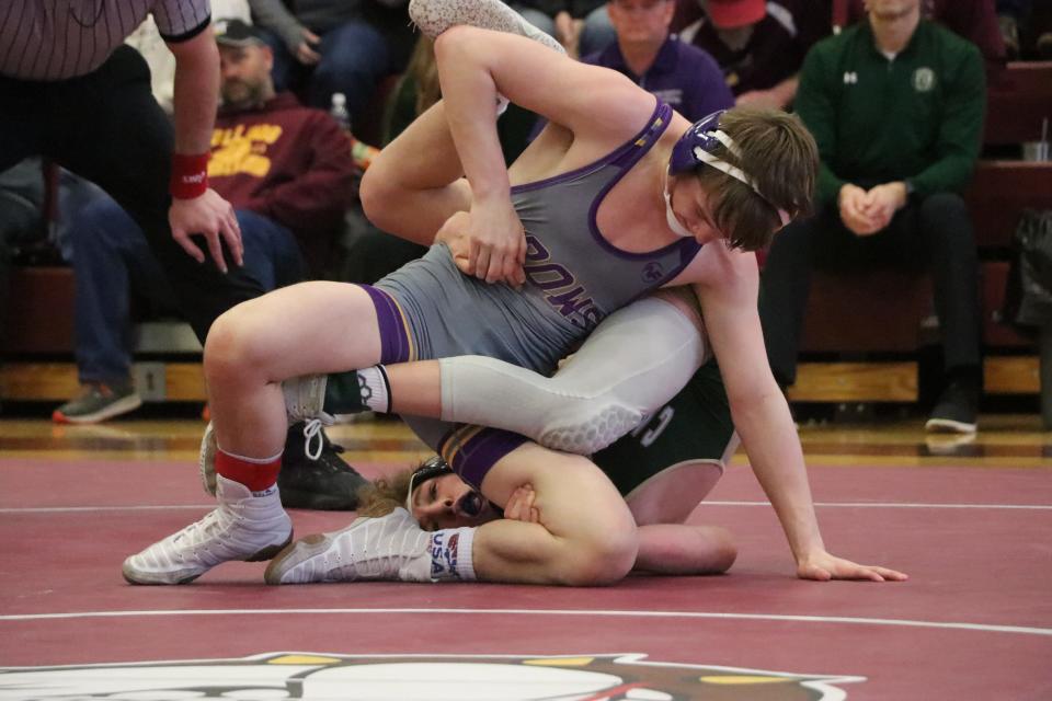 Watertown's Sloan Johannsen improved his season record to 44-0 while claiming the 120-pound championship with a 12-4 win over Sioux Falls Jefferson's Graham Wilde in the Region 1A wrestling tournament on Saturday, Feb. 18, 2023 at Madison.