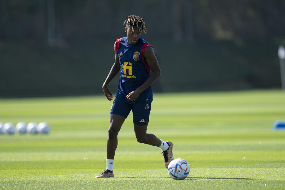 Spain's Nico Williams works out during a training session at Qatar University, in Doha, Qatar, Tuesday, Nov. 29, 2022. Spain will play its first final match in Group E in the World Cup against Japan on Dec. 1. (AP Photo/Julio Cortez)