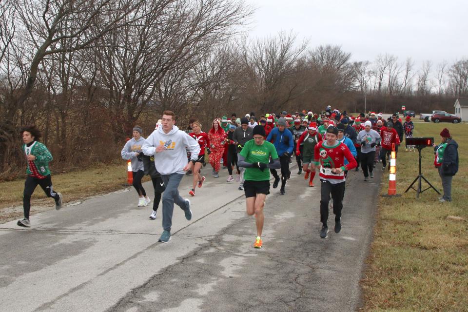 More than 120 people took part in the Gibsonburg Ugly Sweater Run and Walk in 2022. As in years past, entry fee was a new and unwrapped toy or nonperishable food items. This year's run-walk is set for Saturday.