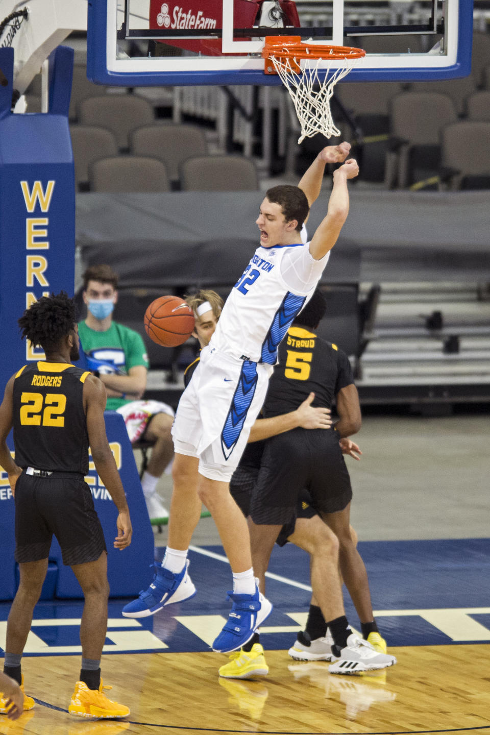 Creighton's Ryan Kalkbrenner celebrates a dunk against Kennesaw State during the first half of an NCAA college basketball game in Omaha, Neb., Friday, Dec. 4, 2020. (AP Photo/Kayla Wolf)