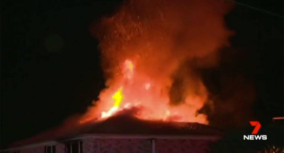 Beneath the flames, an elderly woman and her adult son were trapped inside. Source: 7 News