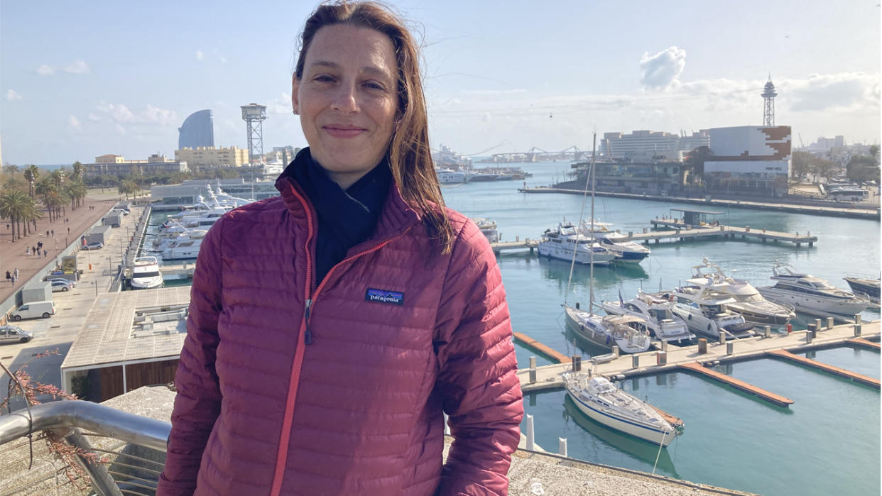 Alex Finley on a rooftop terrace overlooking Barcelona's superyacht marina. Her Twitter column #Yachtwatch sparked global intrigue in oligarchs' luxury vessels. (Ira Luzina)