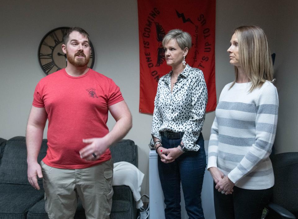 From left, Anytime Fitness personal trainer Zach Beagle, and two of his class attendees Susan Draiss and Heather Jones, talk about their efforts to save the life of Richard McCool, 67, Friday, Feb. 3, 2023. First responders, along with Beagle, Draiss and Jones, helped save McCool’s life when he suffered cardiac arrest while working out at the Milton gym in Dec. 2022