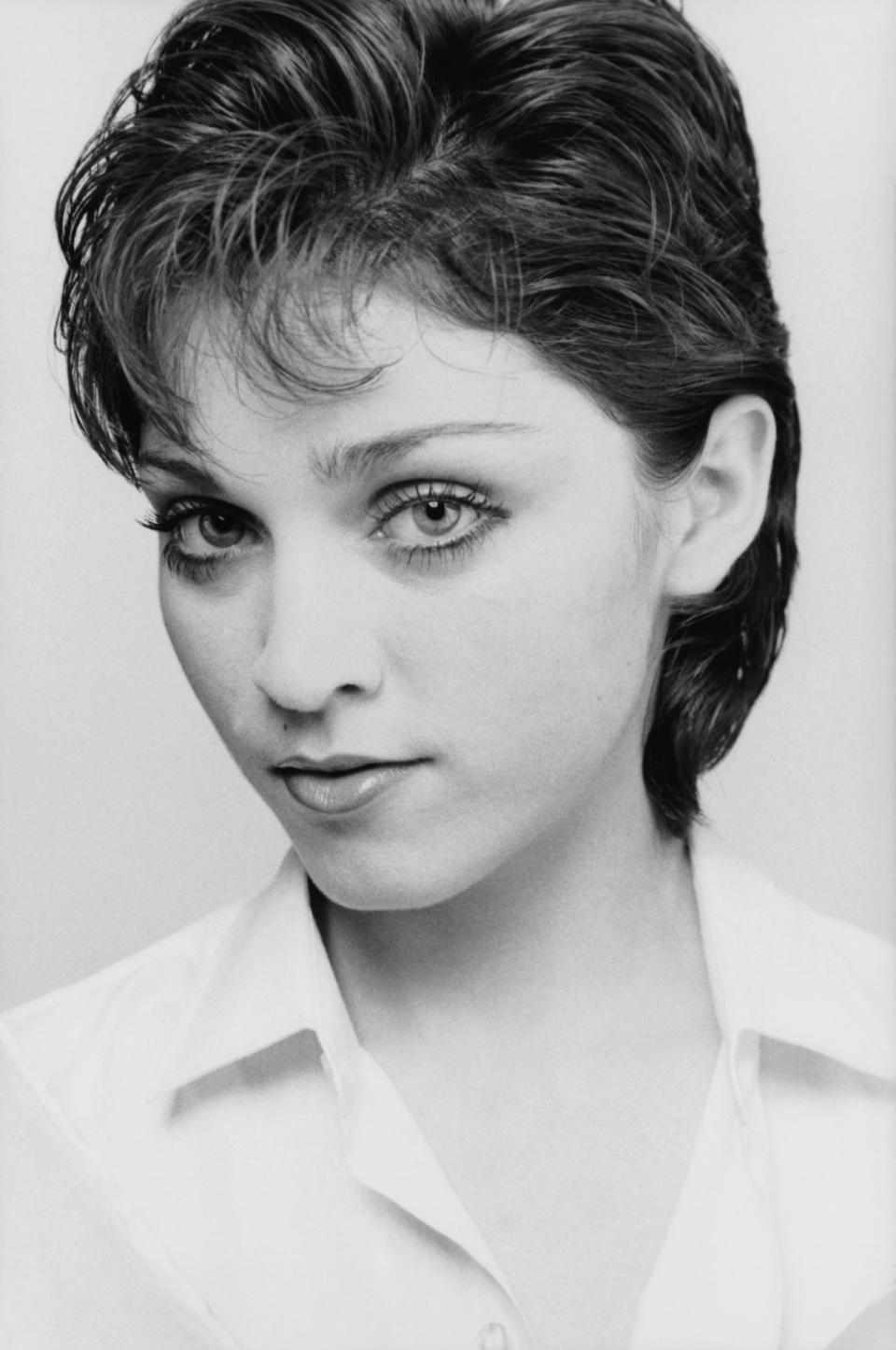 Before she rose to fame as a bottle blonde, Madonna rocked her natural brunette hair and natural makeup.