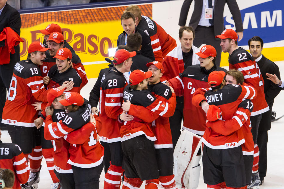 TORONTO, ON - JANUARY 05: Team Canada celebrates the 5-4 win against Russia during the Gold medal game of the 2015 IIHF World Junior Championship on January 05, 2015 at the Air Canada Centre in Toronto, Ontario, Canada. (Photo by Dennis Pajot/Getty Images)