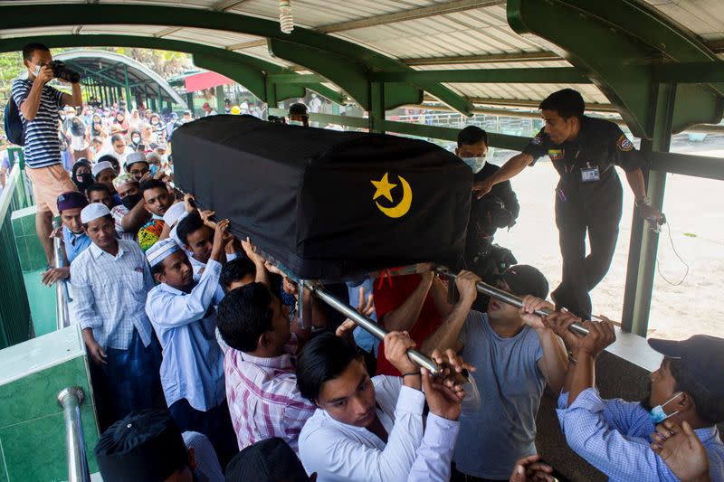 People attend a funeral of NLD's ward chairman U Khin Maung Latt in Yangon