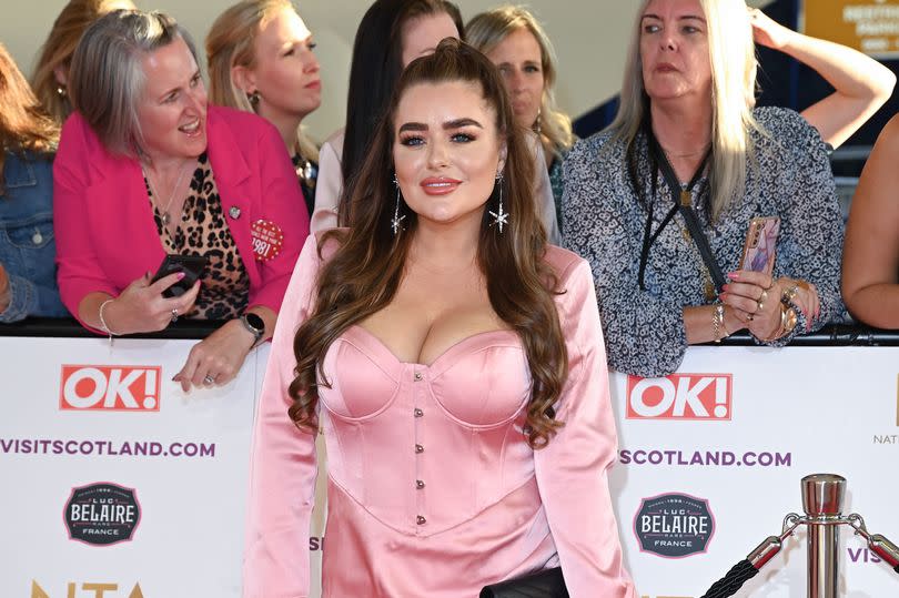 MAFS star Amy Christophers in a short pink dress on the red carpet