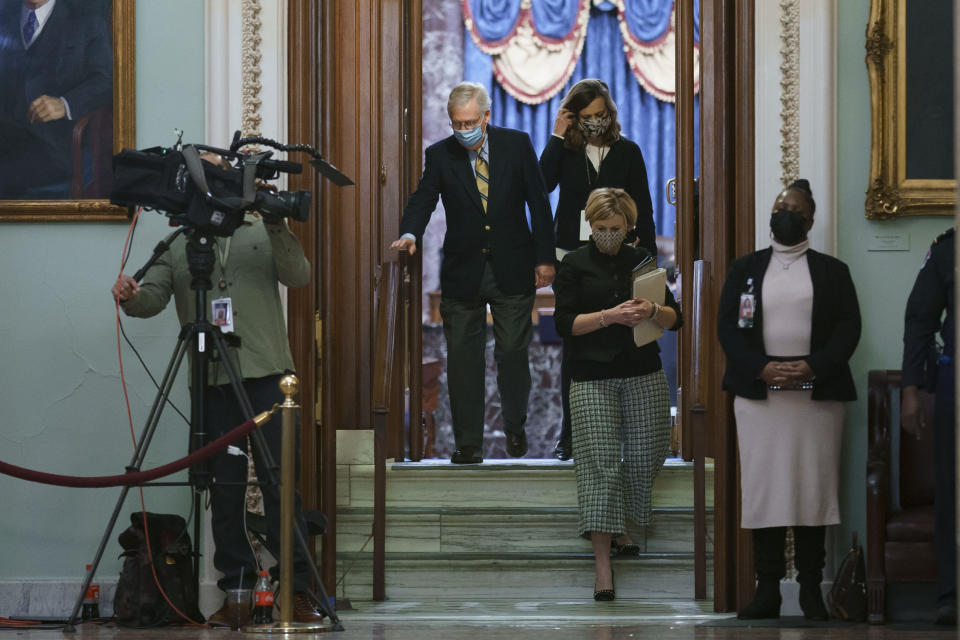 Senate Minority Leader Mitch McConnell, R-Ky., leaves the chamber after the Senate voted not guilty in the impeachment trial of former President Donald Trump on the charge of inciting the January 6 attack on the Congress by a mob of his supporters, at the Capitol in Washington, Saturday, Feb. 13, 2021. After voting to acquit Trump of the impeachment charge, McConnell said there is still "no question" that Trump was "practically and morally responsible for provoking" the deadly attack on the U.S. Capitol. (AP Photo/J. Scott Applewhite)