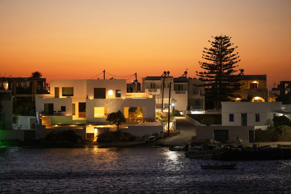 a body of water with buildings along it