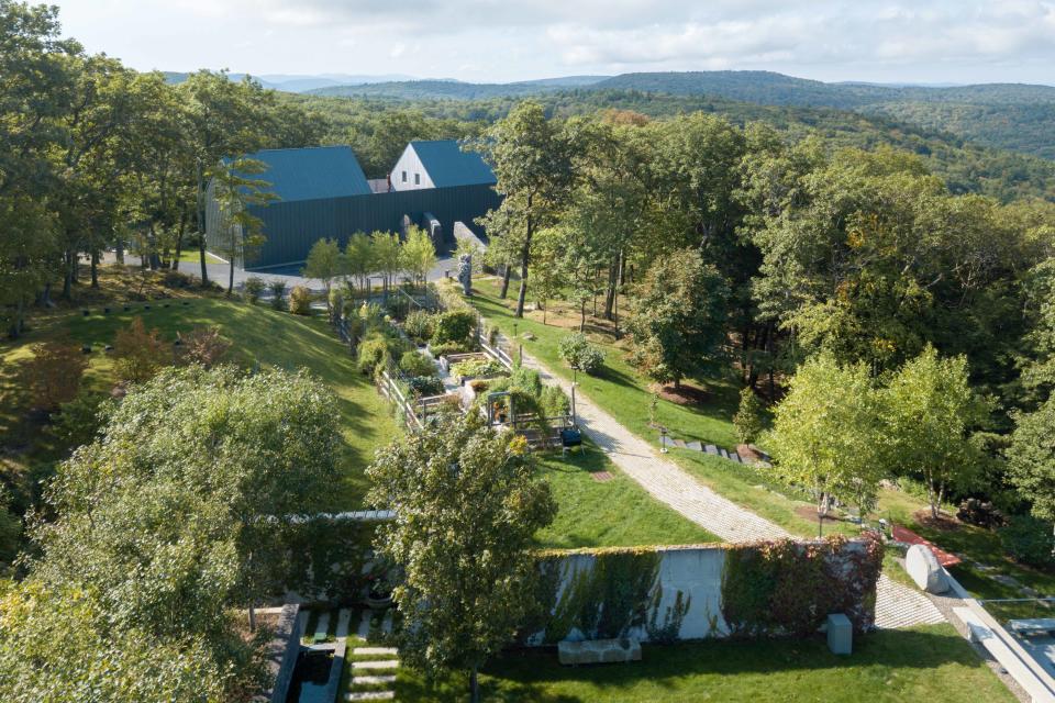 The path from the main house to the art barn leads past the vegetable gardens.