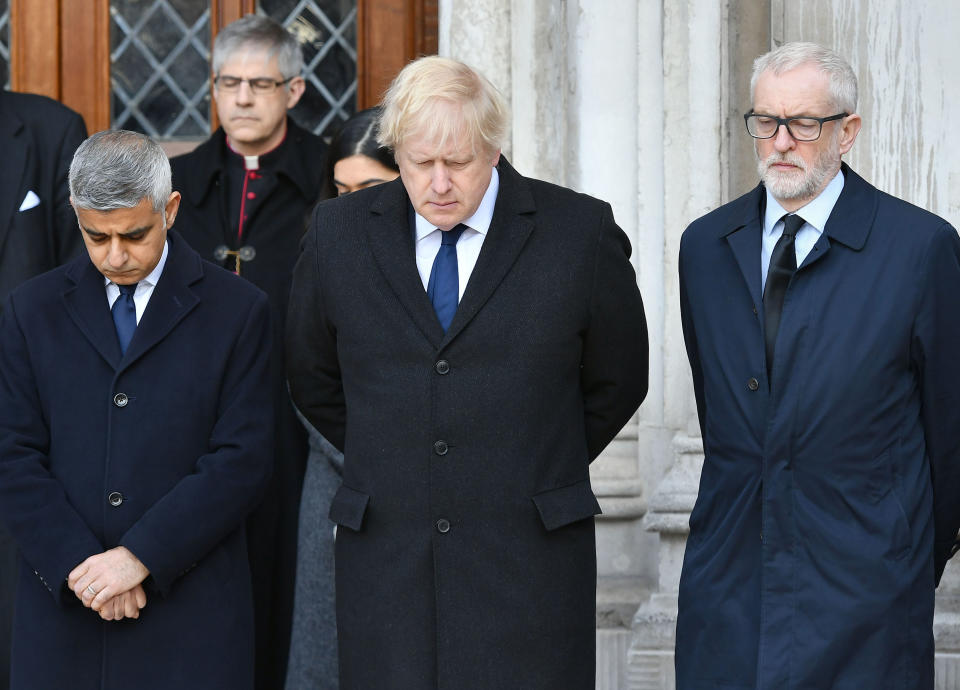 (left to right) Mayor of London Sadiq Khan, Prime Minister Boris Johnson and Labour leader Jeremy Corbyn take part in a vigil in Guildhall Yard, London, to honour the victims off the London Bridge terror attack, as well as the members of the public and emergency services who risked their lives to help others after a terrorist wearing a fake suicide vest went on a knife rampage killing two people, was shot dead by police on Friday.