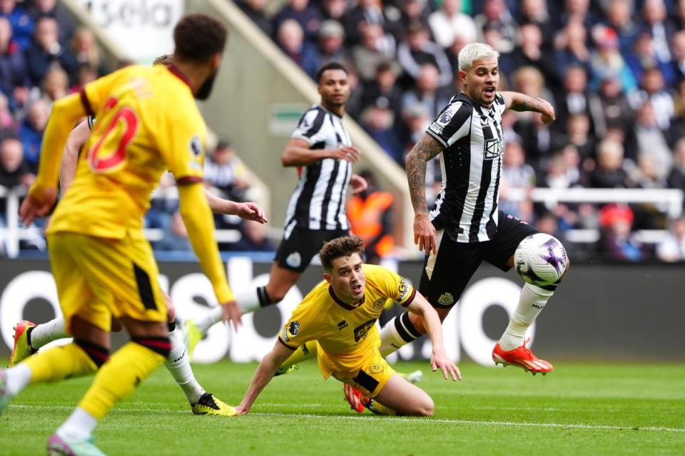 Bruno Guimaraes skips away from his marker during Newcastle's win over Sheffield United <i>(Image: PA)</i>