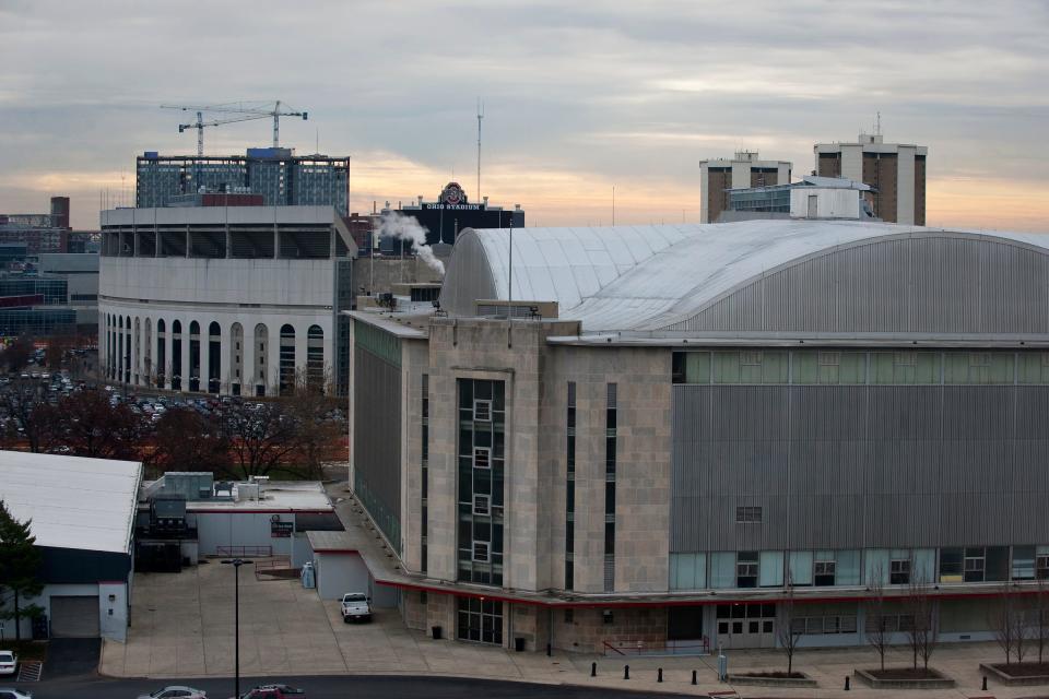 A view of St. John Arena from the 11th floor of the Lane Avenue residence hall with Ohio Stadium in the background, seen in 2012. Built in 1956 the 13,276-seat arena was named after Ohio State men's basketball coach and athletic director Lynn St. John. The arena housed men and women's basketball until they moved to the Jerome Schottenstein center in 1998 but now plans have been proposed to build a new venue.