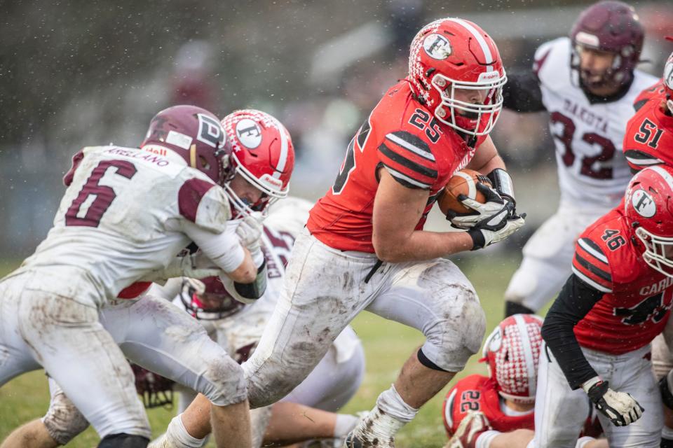 Forreston's Johnny Kobler, shown rushing for 111 yards in Saturday's state quarterfinal win over Dakota, is a converted offensive tackle who leads the NUIC in rushing.
