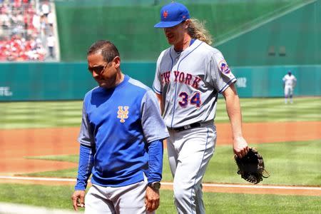 Apr 30, 2017; Washington, DC, USA; New York Mets starting pitcher Noah Syndergaard (34) walks off the field after an apparent injury against the Washington Nationals in the second inning at Nationals Park. Mandatory Credit: Geoff Burke-USA TODAY Sports