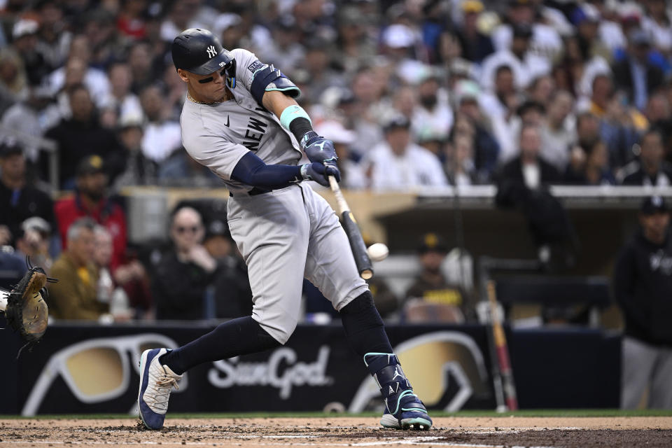 SAN DIEGO, CALIFORNIA - MAY 24: Aaron Judge #99 of the New York Yankees hits a home run against the San Diego Padres during the third inning at Petco Park on May 24, 2024 in San Diego, California. (Photo by Orlando Ramirez/Getty Images)