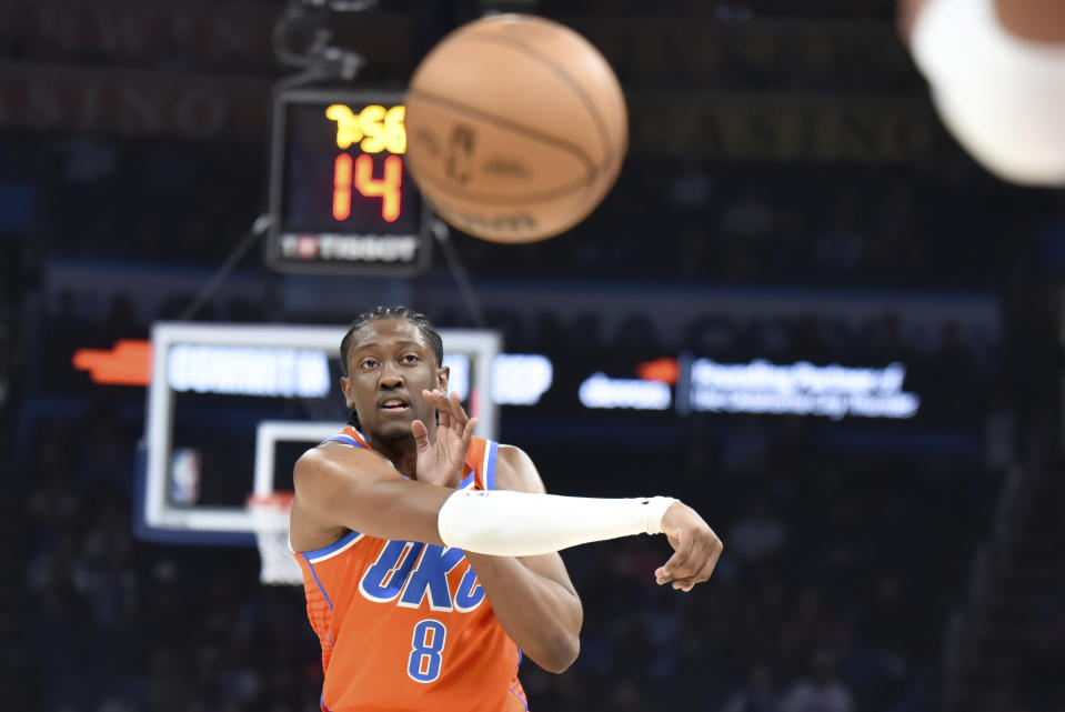 Oklahoma City Thunder forward Jalen Williams passses the ball in the first half of an NBA basketball game against Utah Jazz, Monday, Dec. 11, 2023, in Oklahoma City. (AP Photo/Kyle Phillips)