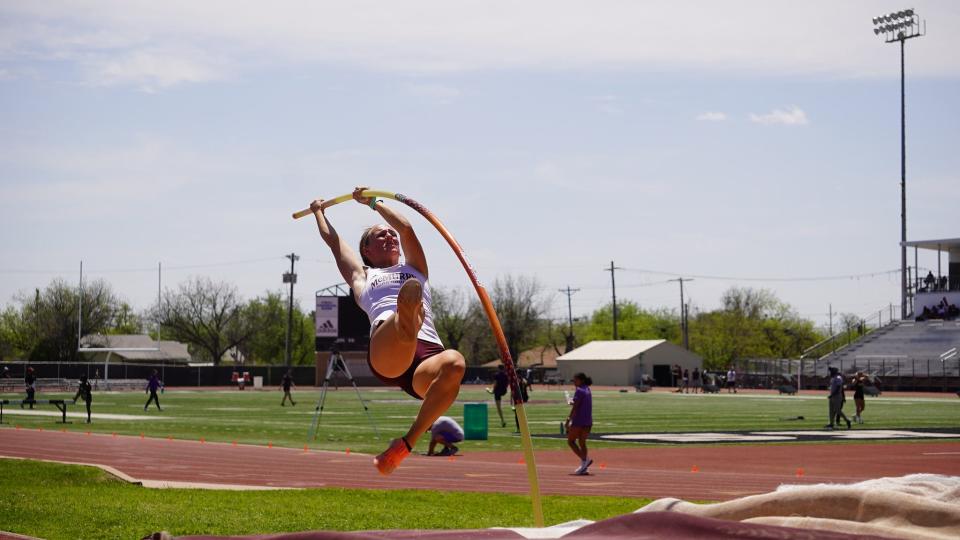 McMurry's Kelby Tidwell practices pole vaulting in practice.