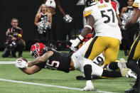 Atlanta Falcons tight end MyCole Pruitt (85) dives into the end zone for a touchdown after a catch against the Pittsburgh Steelers during the second half of an NFL football game, Sunday, Dec. 4, 2022, in Atlanta. (AP Photo/John Bazemore)