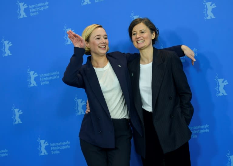 Danish actress Alba August (L) and Danish film director Pernille Fischer Christensen pose during the photo call for the film "Becoming Astrid" at in the Berlin film festival