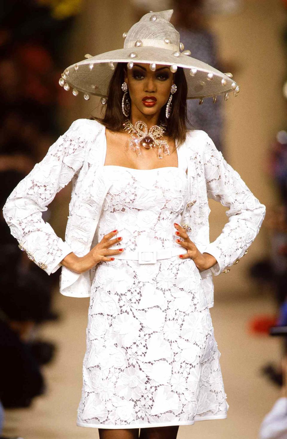 <p>Banks was a vision in white when she donned this white lace number (and a pearl hat) in January 1992. </p>