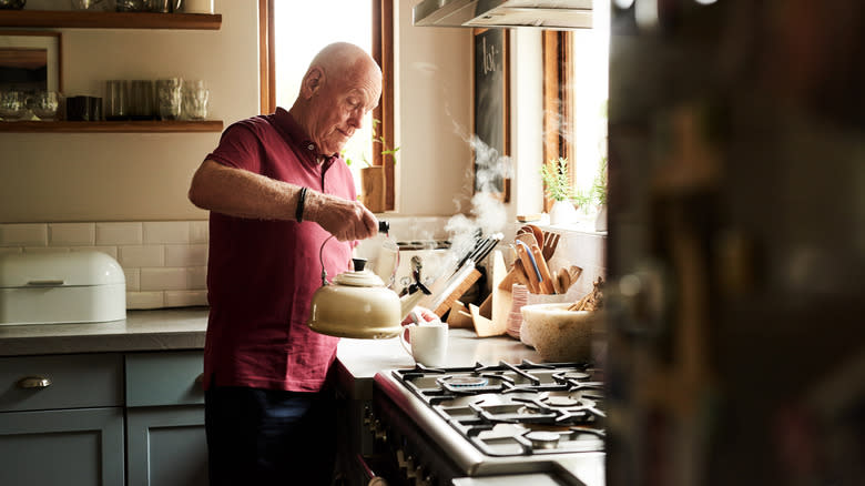 Man making tea at home