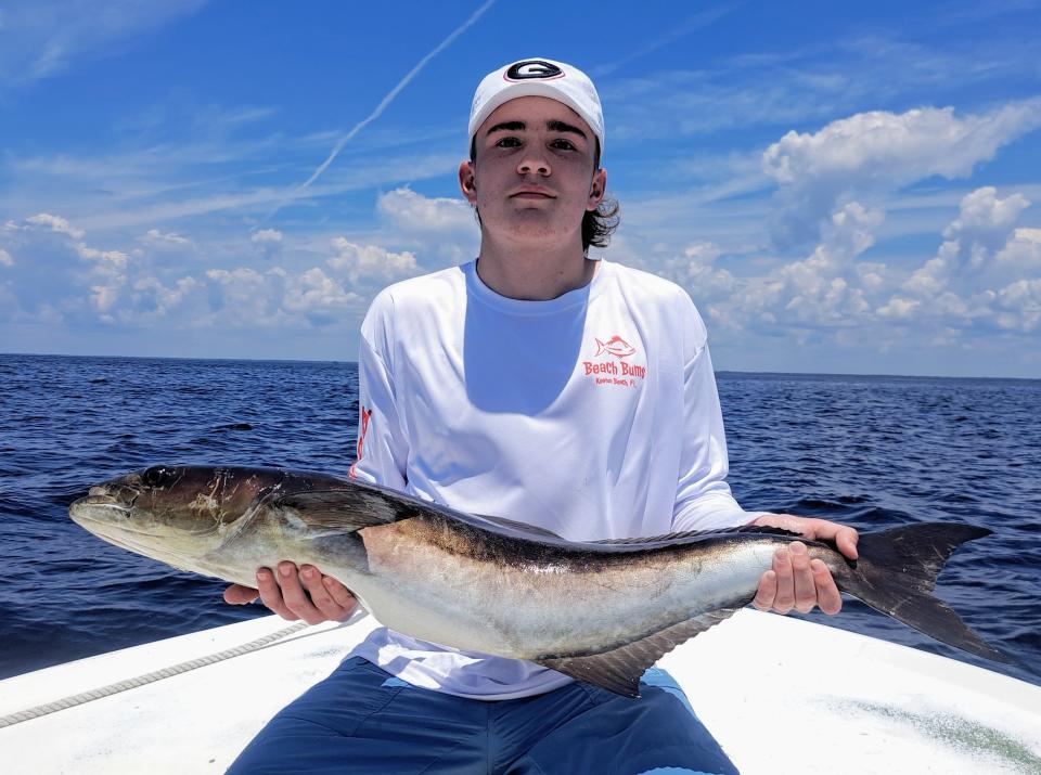 Chris Tucker of Macon , Ga. with a fine 26” redfish;