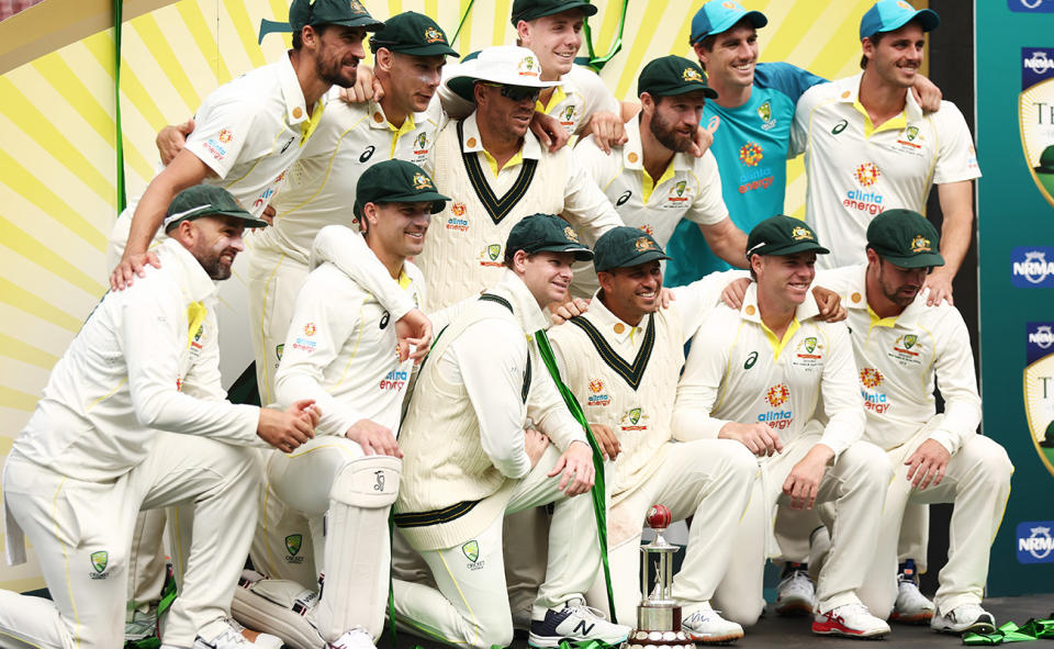 Aussie players, pictured here posing with the Frank Worrell trophy after beating West Indies in the second Test.