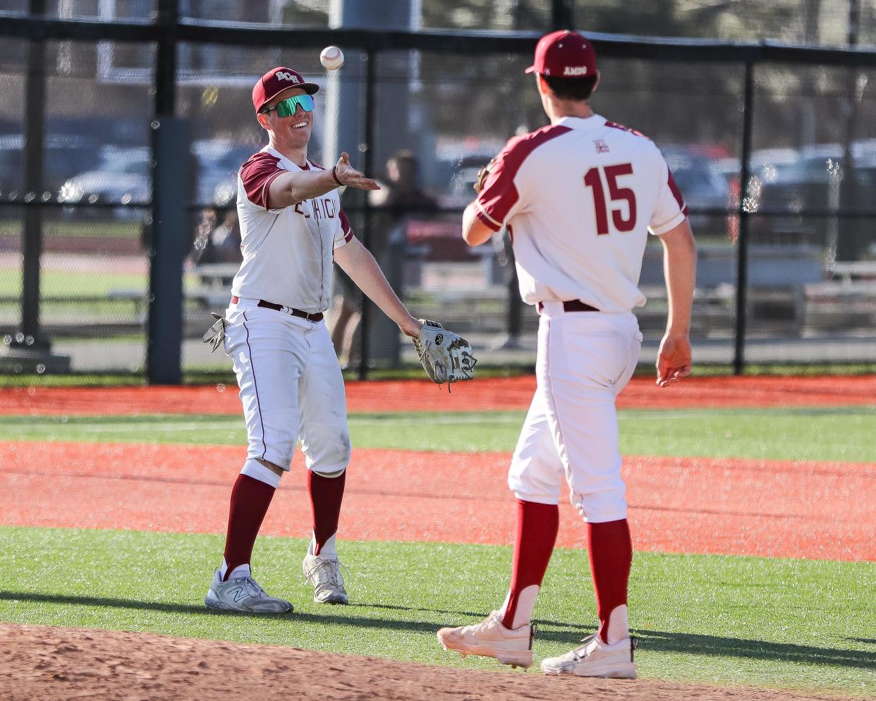 BC High's Cole Bohane, of Hingham, flips the ball to pitcher Liam Kinneen during a game against St. John's Prep at Monan Park on Monday, April 22, 2024.